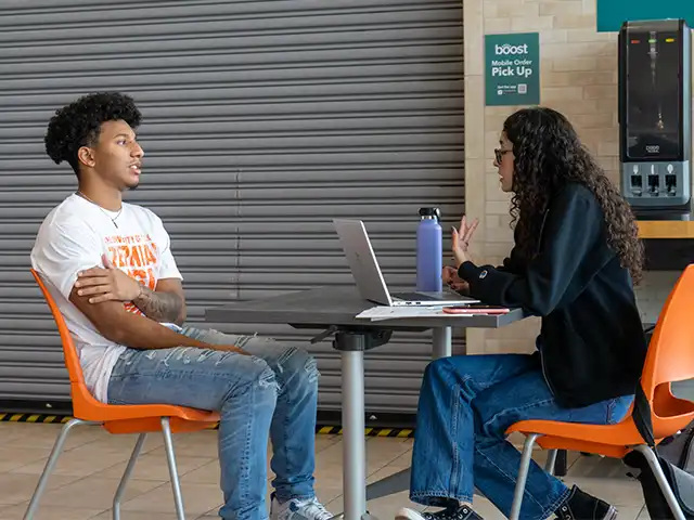 advisor helping a student